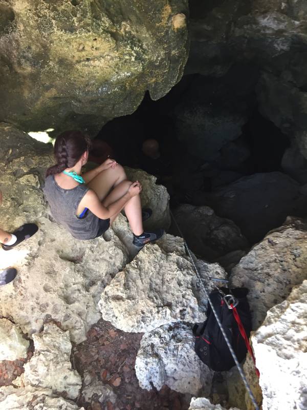 Alex Peering into Cave