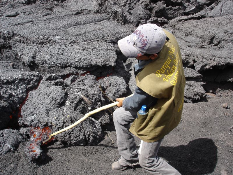 Our Guide Pulling Molten Lava on Volcan de Pacaya