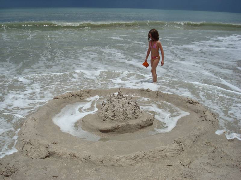 Fighting Against the Tide to Save a Sandcastle