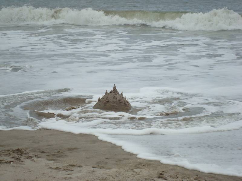 The Tide Takes the First Sandcastle